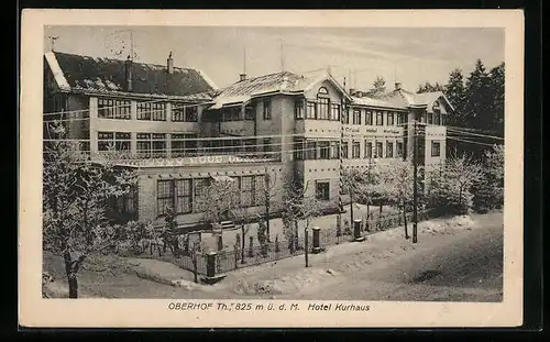 AK Oberhof /Th., Hotel Kurhaus mit Strasse im Winter