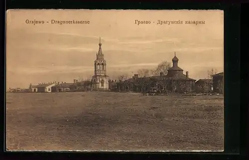 AK Grajewo, Dragonerkaserne mit Kirchen, gesehen von einer Freifläche