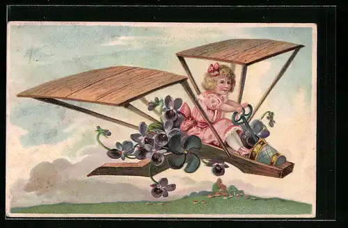 Präge-AK Mädchen steuert geschmücktes Flugzeug