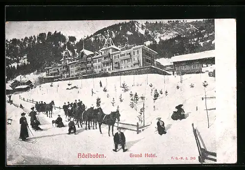 AK Adelboden, Grand Hotel mit Pferdeschlitten, Rodlern und Skiläuferin