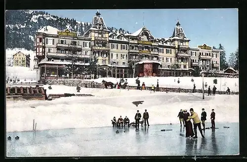 AK Adelboden, Grand Hotel mit Eissportlergruppe