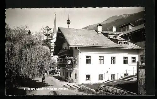 AK Wald im Pinzgau, Strassers Gasthof, Ortspartie mit Kirchturm