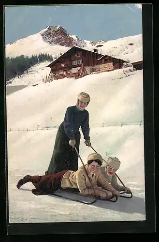 AK Liebespaar liegt auf einem Schlitten