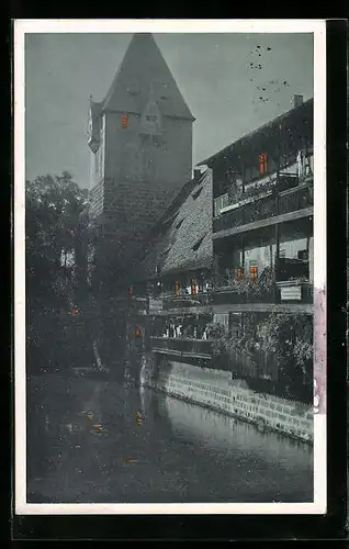 AK Nürnberg, Partie a. d. Pegnitz mit Schuldturm, beleuchtete Fenster