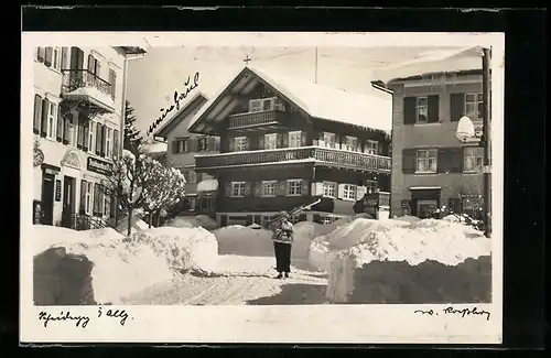 AK Scheidegg i. Allg., verschneite Strassenpartie im Ort