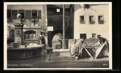 AK Gruyeres, A la Fontaine, Frauen waschen Wäsche