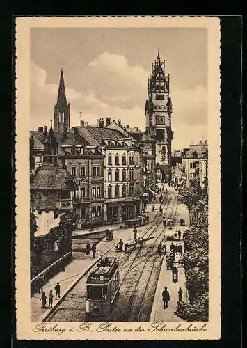 AK Freiburg i. B., Partie an der Schwabenbrücke mit Strassenbahn