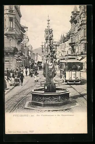 AK Freiburg i. Br., Fischbrunnen in der Kaiserstrasse mit Strassenbahn