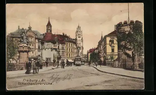 AK Freiburg i. Br., Schwabentorbrücke mit Strassenbahn