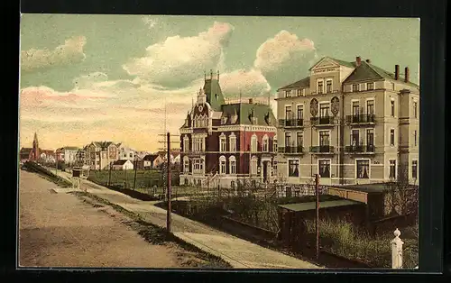 AK Cuxhaven, Nordseebad, Strassenpartie mit Central Hotel