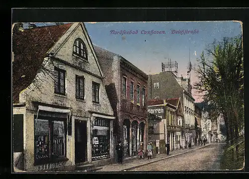 AK Cuxhaven /Nordsee, Deichstrasse mit Geschäften