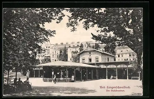 AK Bad Langenschwalbach, Besucher am Zaun zum Stahlbrunnen