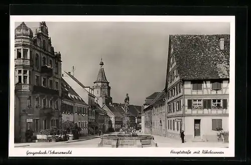 AK Gengenbach /Schwarzw., Hauptstrasse mit Röhrbrunnen