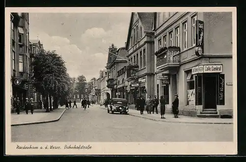 AK Nordenham a. d. Weser, Bahnhofstrasse mit Cafe Central und Geschäften