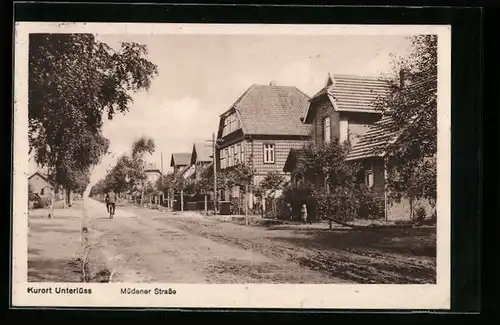 AK Unterlüss, Müdener Strasse mit Radfahrer
