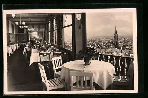 AK Freiburg im Schwarzwald, Gastraum im Schlossberg Restaurant mit Blick auf die Stadt