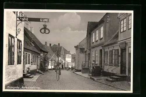 AK Brogade, Aeroskoping, Mann auf einem Hochrad