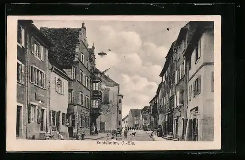 AK Ensisheim /O.-Els., Strassenpartie mit Zigarrengeschäft