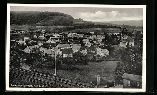 AK Niederdresselndorf /Krs. Siegen, Teilansicht mit Bahngleis