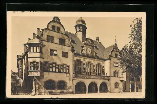 AK Freiburg i. Br., Kaufhaus im Sonnenschein