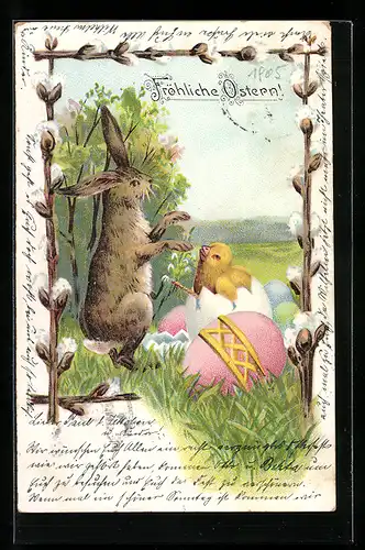 AK Osterhase mit Osterküken in der Eierschale auf einer Wiese