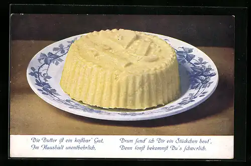 AK Stück Butter auf einem Teller