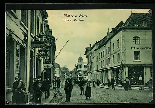 AK Moers a. Rhein, Strassenpartie mit Apotheke