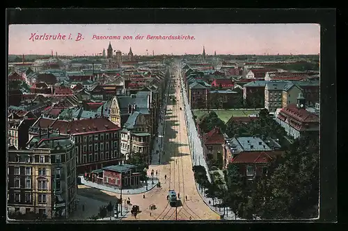 AK Karlsruhe i. B., Strassenpartie mit Strassenbahn von der Bernharduskirche aus gesehen