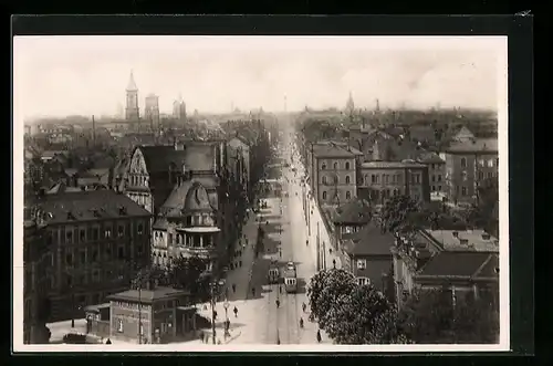 AK Karlsruhe, Strassenpartie mit Strassenbahn von der Bernharduskirche aus gesehen