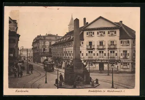 AK Karlsruhe, Rondellplatz mit Denkmal und Strassenbahn