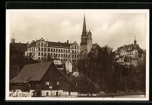 AK Löbau /Sa., Ortspartie mit Kirche