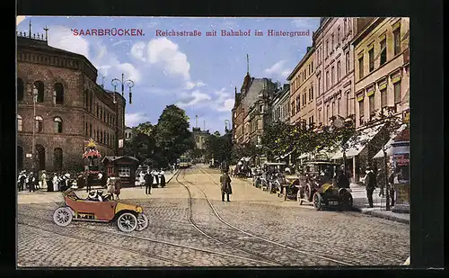 AK Saarbrücken, Strassenbahn vor Bahnhof in der Reichsstrasse
