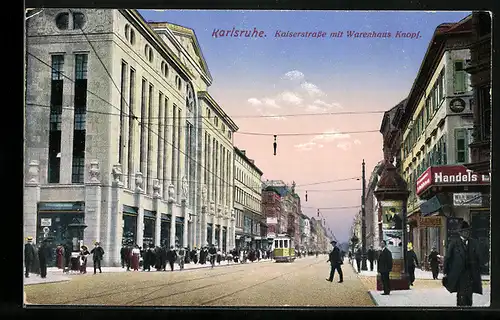 AK Karlsruhe, Kaiserstrasse mit Geschäften, Litfasssäule und Strassenbahn