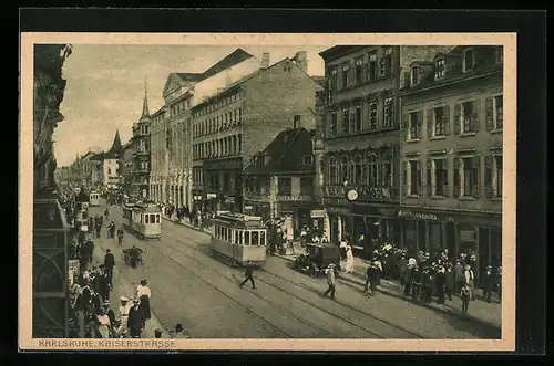 AK Karlsruhe, Kaiserstrasse mit Geschäften und Strassenbahn