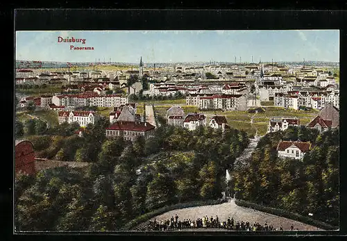 AK Duisburg, Panoramaansicht der Stadt mit den Industrieschornsteinen im Hintergrund