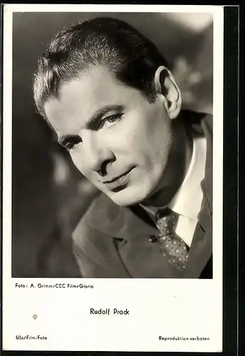 AK Schauspieler Rudolf Prack mit leichtem Lächeln und Krawatte
