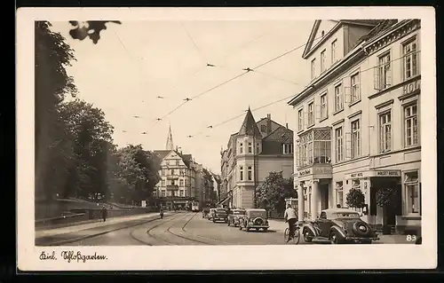 AK Kiel, Schlossgarten Strasse mit Fahrradfahrer vor Hotel