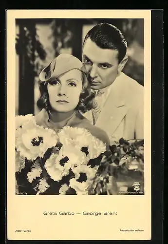 AK Schauspielerin Greta Garbo und Schauspieler George Brent mit ernstem Blick