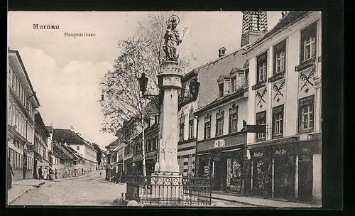 AK Murnau, Hauptstrasse mit Geschäften und Denkmal