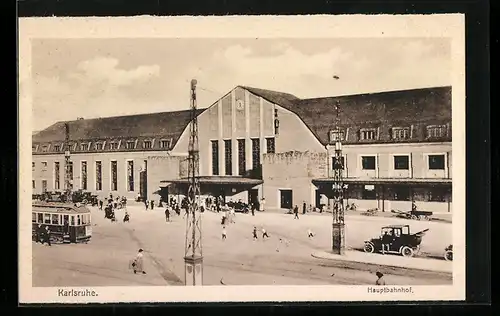 AK Karlsruhe, Hauptbahnhof mit Strassenbahn und Auto