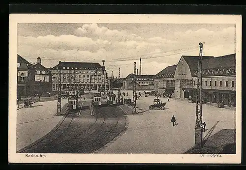 AK Karlsruhe, Bahnhofplatz mit Strassenbahnen, Bahnhof