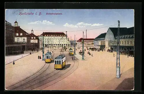 AK Karlsruhe i. B., Bahnhof mit Bahnhofsplatz und Strassenbahnen