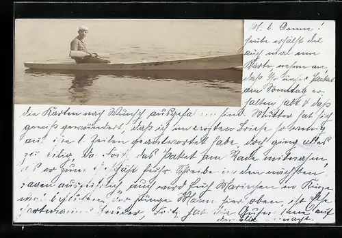 AK Mann mit Paddel im Kanu