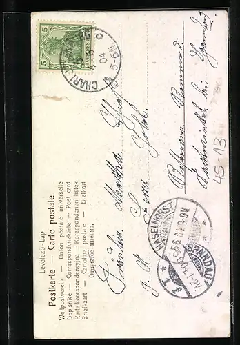 AK Herr bindet Dame die Schlittschuhe zu