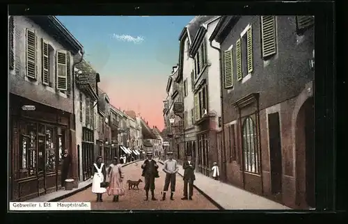 AK Gebweiler i. E., Hauptstrasse mit kleiner Gruppe