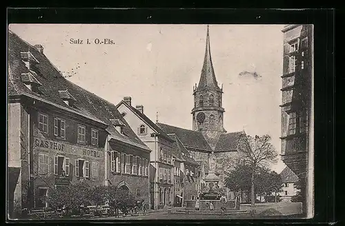 AK Sulz, Teilansicht mit Brunnen und Kirche