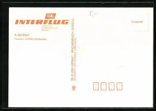 AK Flugzeug IL62 der Interflug auf der Startbahn in der Nacht