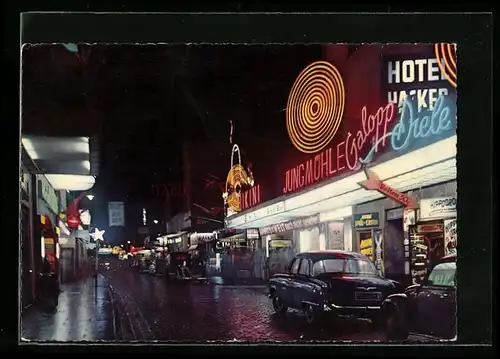 AK Hamburg-St. Pauli, Strasse Grosse Freiheit mit Hotel und Spielcasino bei Nacht
