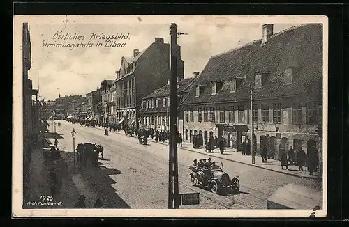 AK Libau, Ortspartie, Stimmungsbild in Libau, Auto