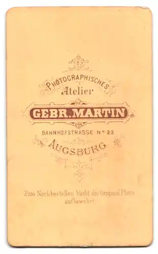 Fotografie Gebr. Martin, Augsburg, Bahnhofstrasse 22, Junge Dame mit Flechtfrisur und Kreuzkette